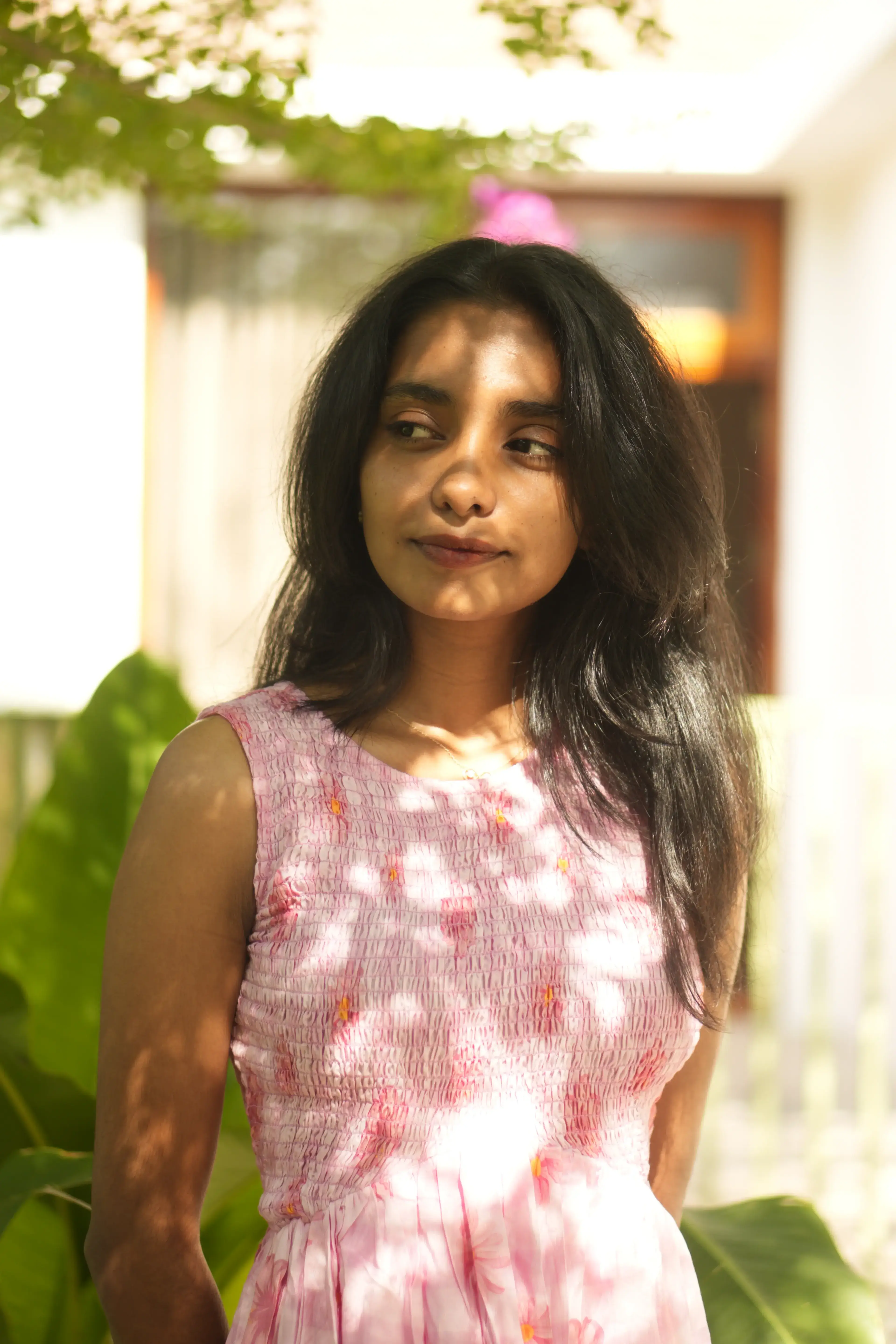 Lifestyle portrait in sunlit garden